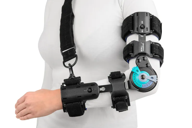 MEYRA MEDICAL QMED ELBOW PRO PLUS PRAWA Orteza Stawu Łokciowego Z Uchwytem Na Dłoń